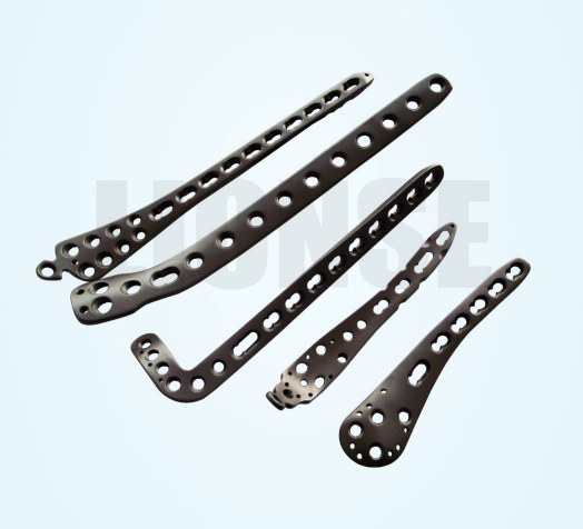 Why are titanium alloy components favoured for medical implants?