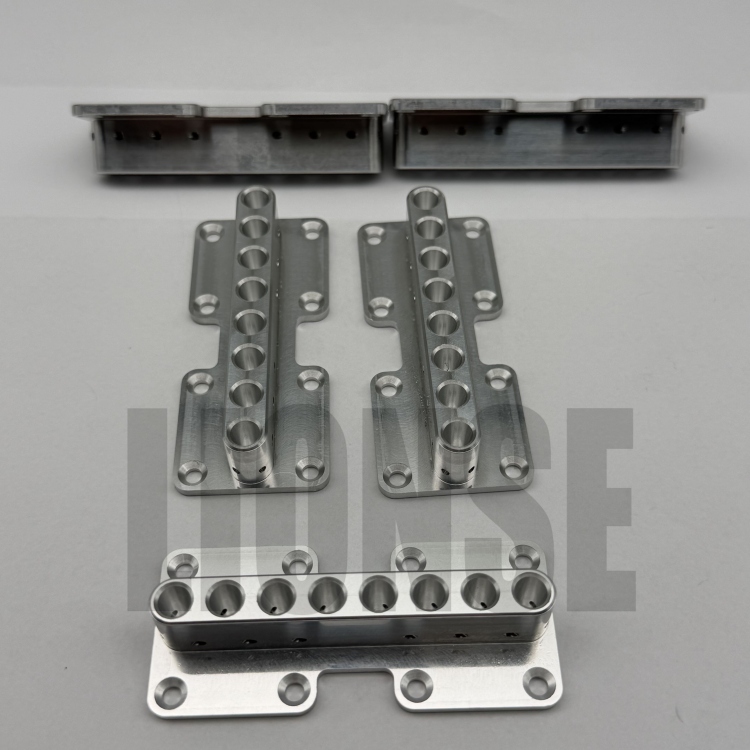 How is the black processing of aluminum parts done?